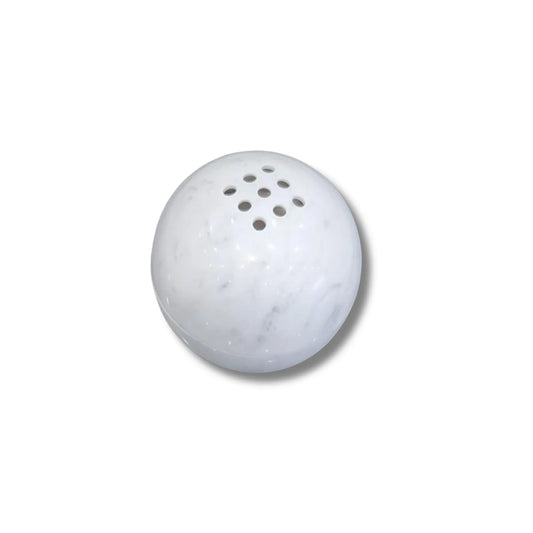 Carrara white marble sphere incense burner with natural veining white background