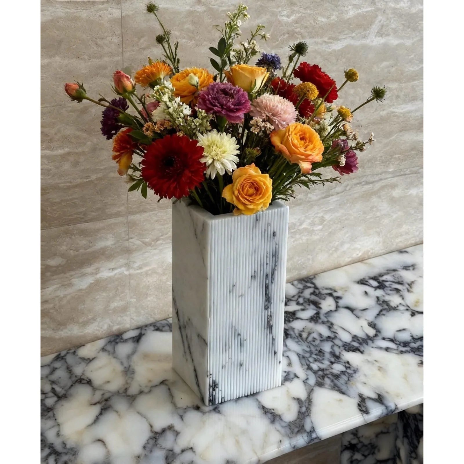 Lilac marble vase with ribbed texture modern decor with flowers 