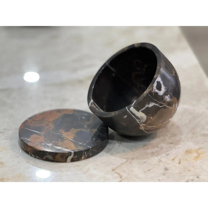 Marble butter dish with lid on kitchen counter wide open