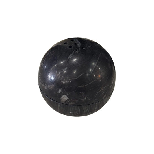 Titanium black marble sphere incense burner with natural stone texture on white background