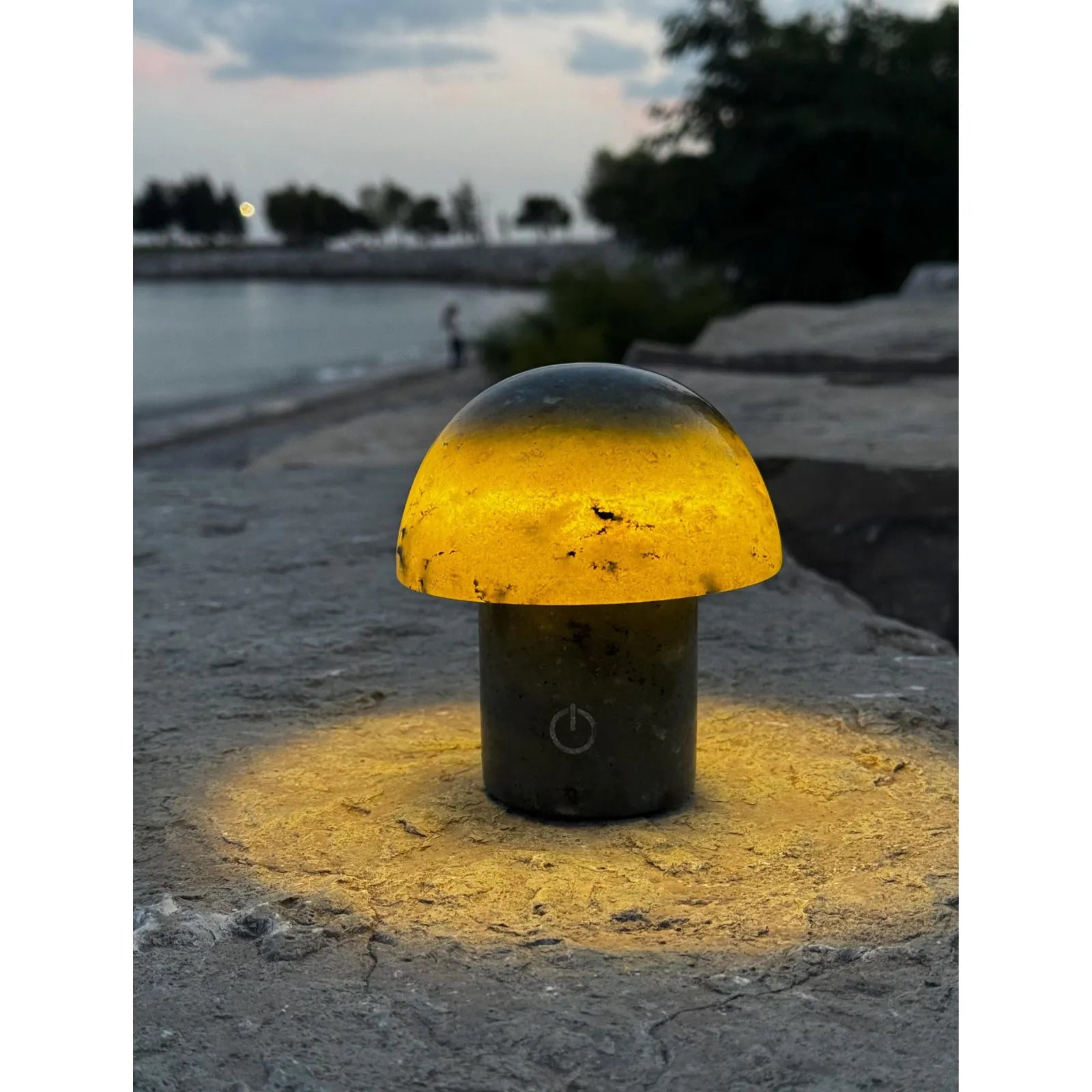 luxury natural stone bedside lamp blue jade decor glowing on th beach